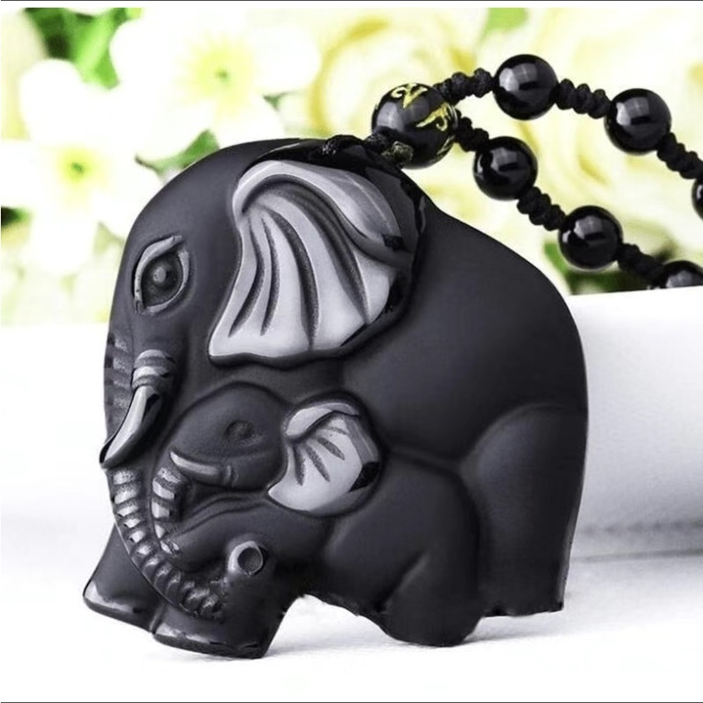 Carved obsidian elephant Necklace